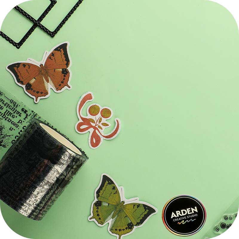 Arden Creative Studio brand products on green background
